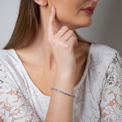 Bransoletka tenisowa SAVICKI: białe złoto, tanzanity, diamenty